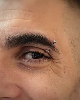 Tout savoir sur le piercing de l’arcade, photo 3 sur 14