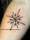 patricia_noirdejais_noir-de-jais_tattoo-on-move_fine-line-tattoo_rose-des-vents_original