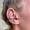 patricia_noirdejais_noir-de-jais_tattoo-on-move_fine-line-tattoo_feuillage_handpoke_oreille_original