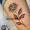 patricia_noirdejais_noir-de-jais_tattoo-on-move_fine-line-tattoo_fleur_rose_cheville_original