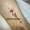 patricia_noirdejais_noir-de-jais_tattoo-on-move_fine-line-tattoo_oeil_lune_arabesques_cheville_bleu_original